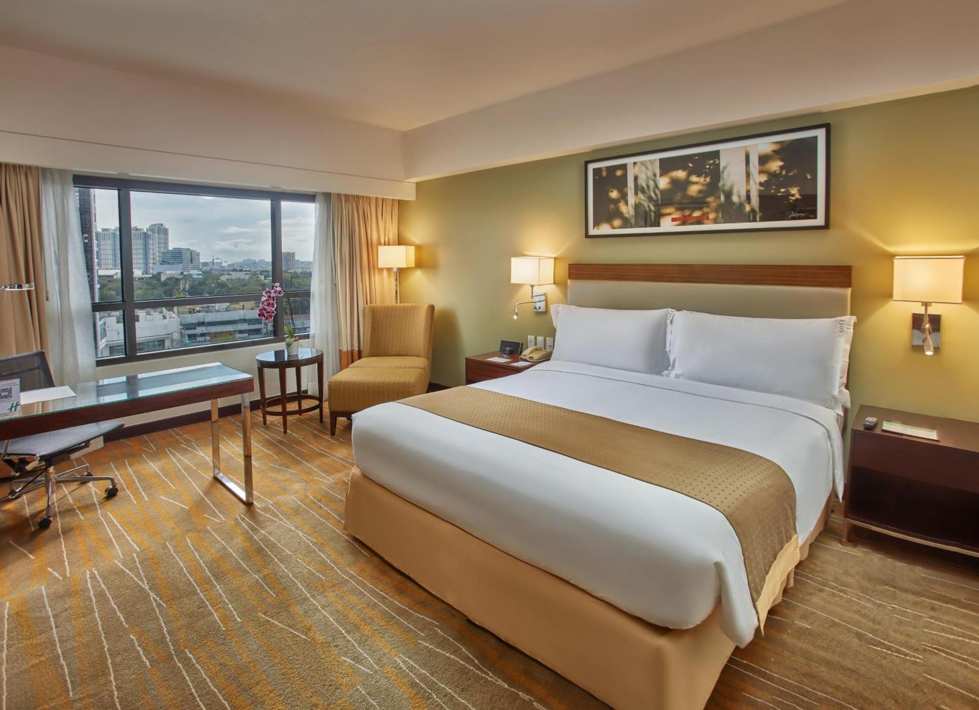 فندق هوليداي إن آند سويتس ماكاتي المظهر الخارجي الصورة Deluxe Room